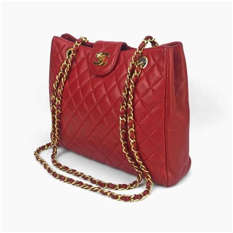 red chanel bag with gold chain|Chanel bag with gold ribbon.